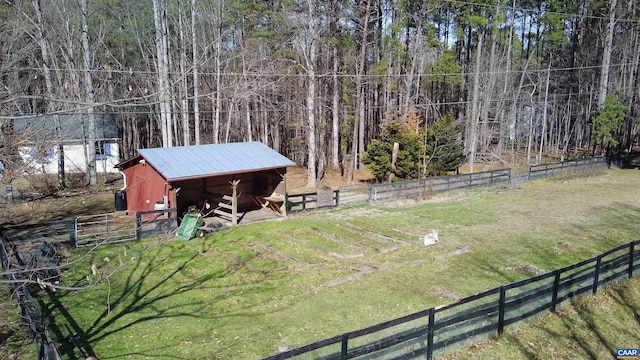 3264 Martin Kings Rd, Charlottesville, VA 22903 - view of yard featuring an outbuilding, a view of trees, a pole building, and an exterior structure