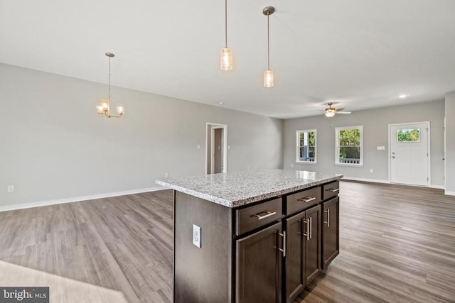 Kentuck Pl, Mineral, VA 23117 - kitchen featuring open floor plan, wood finished floors, and a ceiling fan