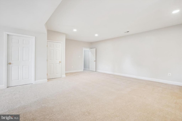 unfurnished bedroom with carpet floors, recessed lighting, and baseboards