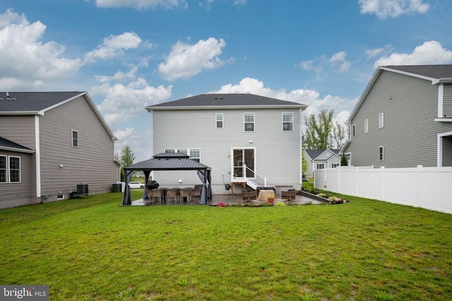 rear view of house featuring a gazebo, a patio area, entry steps, and cooling unit