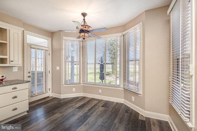 3617 Hidden Acres Way, Partlow, VA 22534 - unfurnished dining area featuring dark wood-style flooring and a ceiling fan
