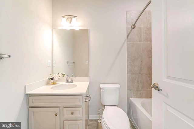 4724 Torrey Ln, Fredericksburg, VA 22408 - bathroom with toilet, vanity, tile patterned flooring, shower / bath combination, and baseboards