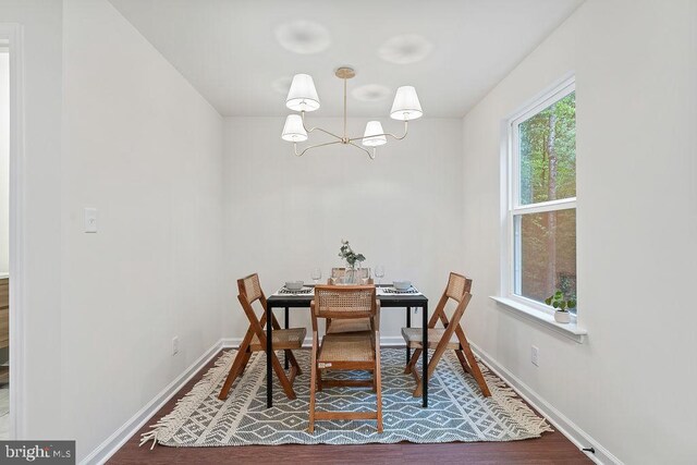 5925 Stubbs Bridge Rd, Mineral, VA 23117 - dining room with a chandelier and wood finished floors