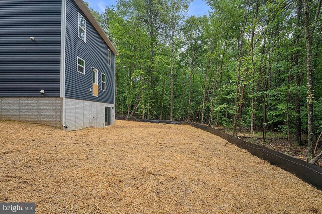 5925 Stubbs Bridge Rd, Mineral, VA 23117 - view of yard with a forest view