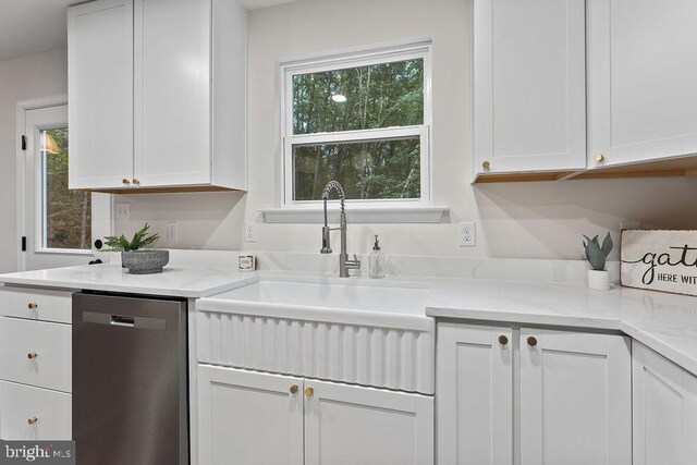 5925 Stubbs Bridge Rd, Mineral, VA 23117 - kitchen featuring stainless steel dishwasher and white cabinetry