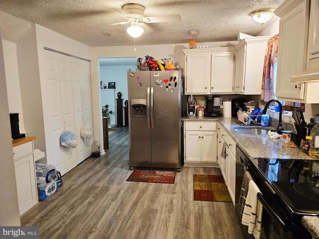 11708 Eisenhower Ln, Fredericksburg, VA 22407 - kitchen featuring stainless steel fridge with ice dispenser, wood finished floors, a ceiling fan, electric stove, and a textured ceiling