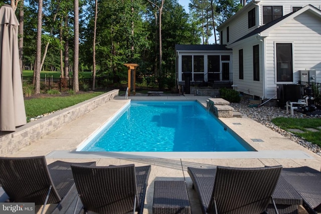 11606 Little Bay Harbor Way, Spotsylvania, VA 22551 - swimming pool with a sunroom and a patio area