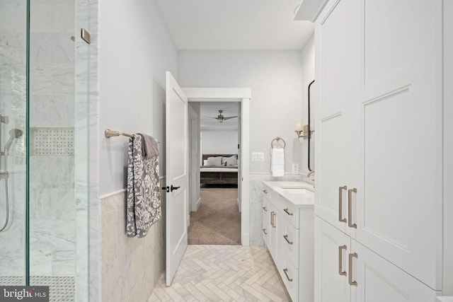 11606 Little Bay Harbor Way, Spotsylvania, VA 22551 - ensuite bathroom featuring a marble finish shower, vanity, and a ceiling fan