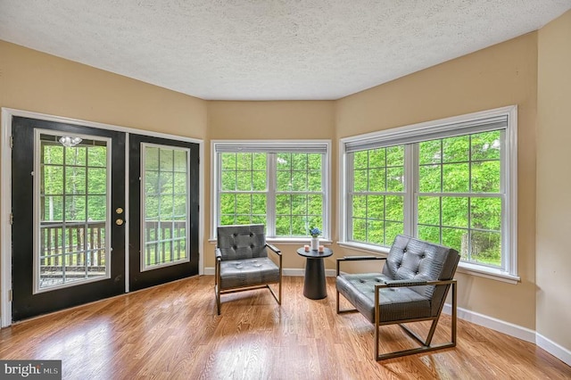 520 Oak Grove Dr, Mineral, VA 23117 - living area featuring baseboards, french doors, a textured ceiling, and wood finished floors