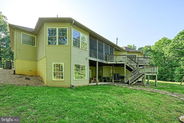 520 Oak Grove Dr, Mineral, VA 23117 - back of property with stairway, a wooden deck, a yard, a patio area, and central air condition unit