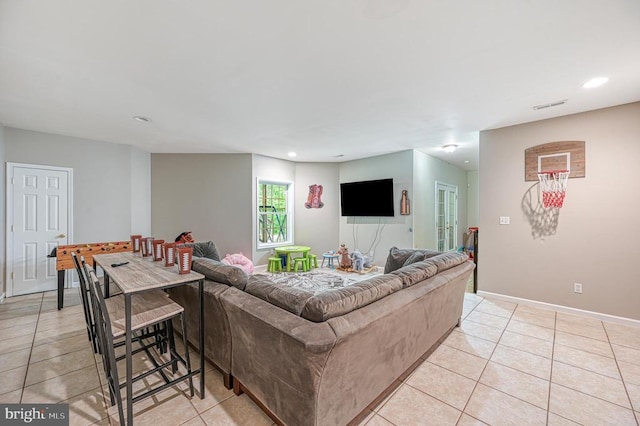 520 Oak Grove Dr, Mineral, VA 23117 - living room with light tile patterned floors, recessed lighting, and baseboards