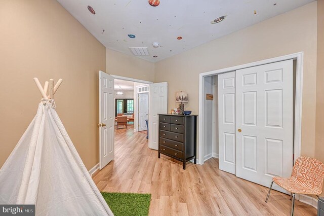 520 Oak Grove Dr, Mineral, VA 23117 - bedroom with light wood-style floors, a closet, and baseboards