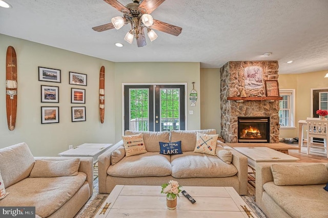 520 Oak Grove Dr, Mineral, VA 23117 - living area featuring a textured ceiling, ceiling fan, a fireplace, and recessed lighting