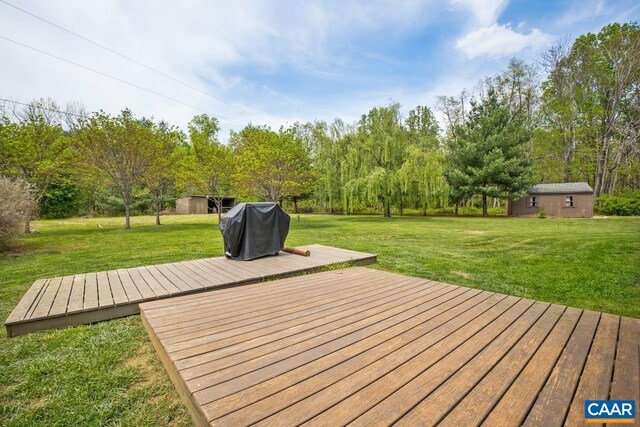 72 Katies Way, Nellysford, VA 22958 - wooden terrace featuring a yard, a grill, and an outbuilding