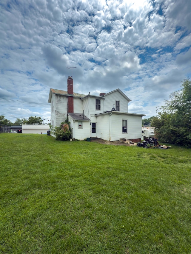 2329 Fort Ave, Lynchburg, VA 24501 - back of property featuring a chimney and a yard