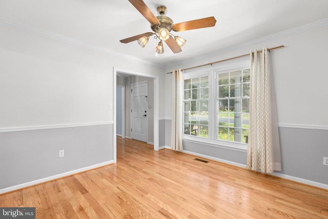 5310 Leavells Crossing Dr, Fredericksburg, VA 22407 - empty room featuring wood finished floors, crown molding, and a ceiling fan