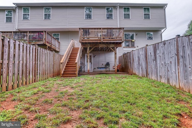 1905 Crepe Myrtle Ln, Culpeper, VA 22701 - rear view of house featuring a deck, a fenced backyard, and stairway