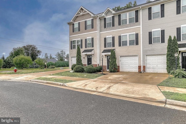 1905 Crepe Myrtle Ln, Culpeper, VA 22701 - townhome / multi-family property with driveway, a garage, and brick siding
