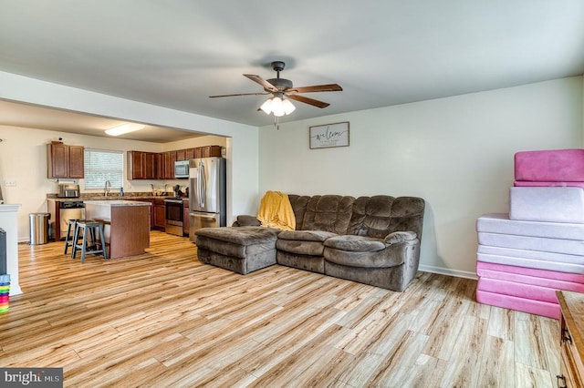 1905 Crepe Myrtle Ln, Culpeper, VA 22701 - living room with light wood-style flooring and a ceiling fan