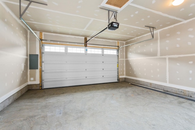 3247 Preston Shore Dr Unit 18D, Rockingham, VA 22801 - garage featuring a garage door opener and baseboards