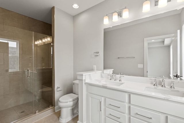3247 Preston Shore Dr Unit 18D, Rockingham, VA 22801 - bathroom featuring toilet, double vanity, a stall shower, and recessed lighting