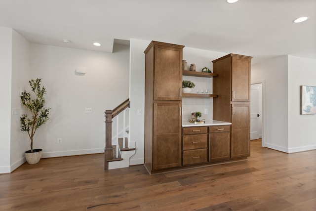 3247 Preston Shore Dr Unit 18D, Rockingham, VA 22801 - bar with recessed lighting, stairway, dark wood-type flooring, and baseboards