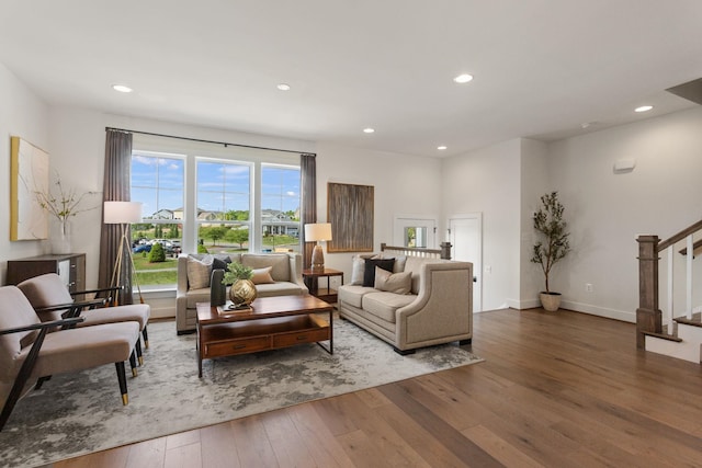 3247 Preston Shore Dr Unit 18D, Rockingham, VA 22801 - living room featuring wood-type flooring, stairway, recessed lighting, and baseboards