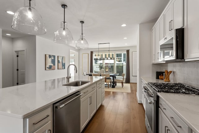 3247 Preston Shore Dr Unit 18D, Rockingham, VA 22801 - kitchen with stainless steel appliances, a sink, tasteful backsplash, recessed lighting, and white cabinets