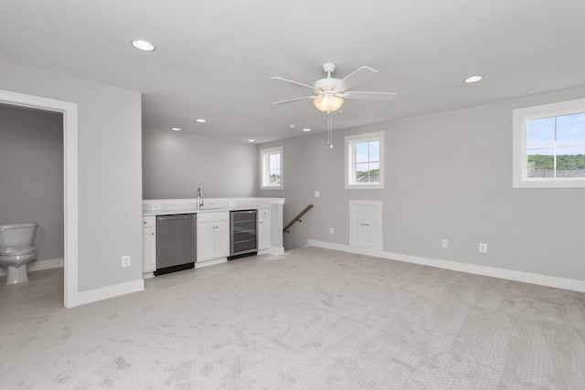 3247 Preston Shore Dr Unit 18D, Rockingham, VA 22801 - below grade area featuring wine cooler, recessed lighting, light colored carpet, ceiling fan, and baseboards