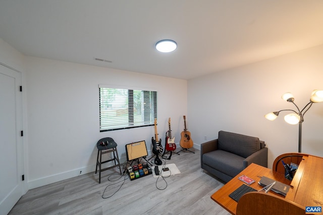 320A 11th St NE, Charlottesville, VA 22902 - sitting room featuring wood finished floors and baseboards