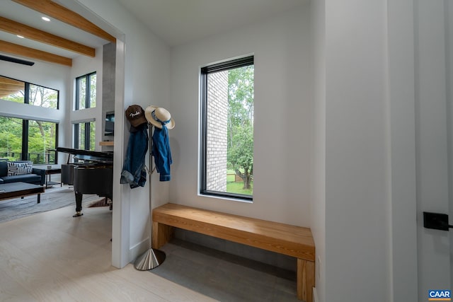 320A 11th St NE, Charlottesville, VA 22902 - mudroom with beam ceiling, baseboards, and wood finished floors