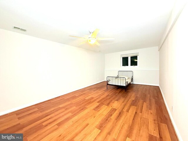 unfurnished bedroom featuring hardwood / wood-style floors