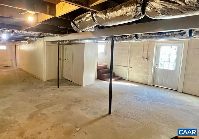 below grade area with concrete block wall