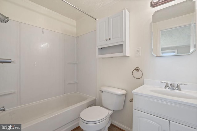 bathroom featuring toilet,  shower combination, and vanity