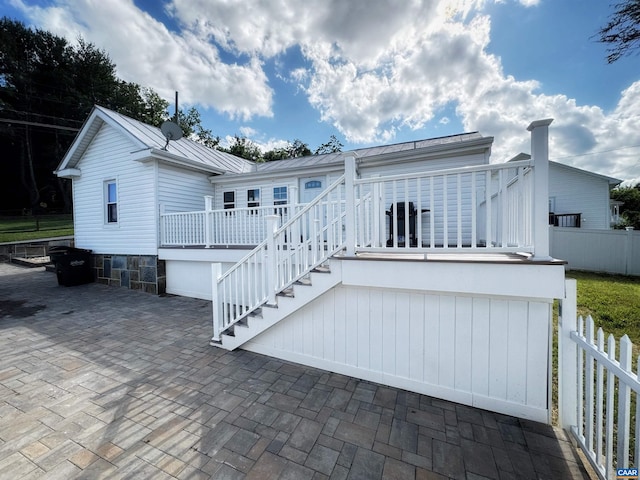 107 Gay St W, Staunton, VA 24401 - rear view of property featuring a patio area, a deck, stairs, and a metal roof