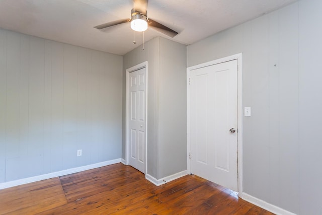 99 Sharp Hill Ln, Hinton, VA 22831 - unfurnished bedroom with dark wood-type flooring, a closet, and ceiling fan
