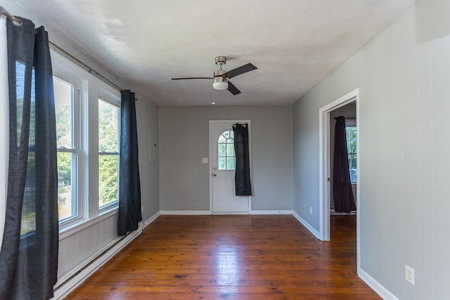 99 Sharp Hill Ln, Hinton, VA 22831 - spare room with wood-type flooring, a baseboard radiator, and ceiling fan