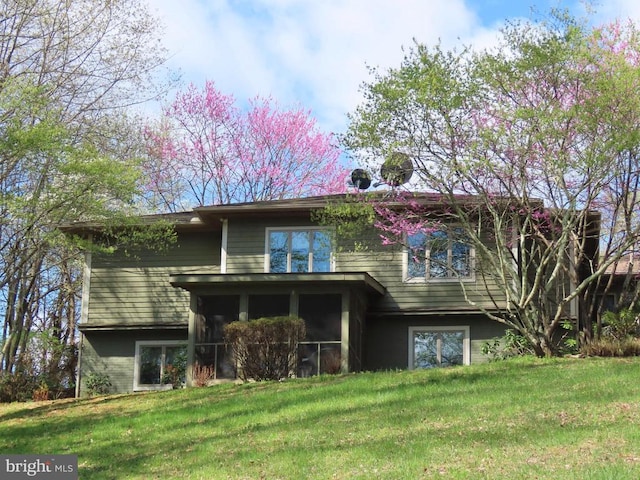 3016 Etlan Rd, Etlan, VA 22719 - rear view of house featuring a lawn and a sunroom