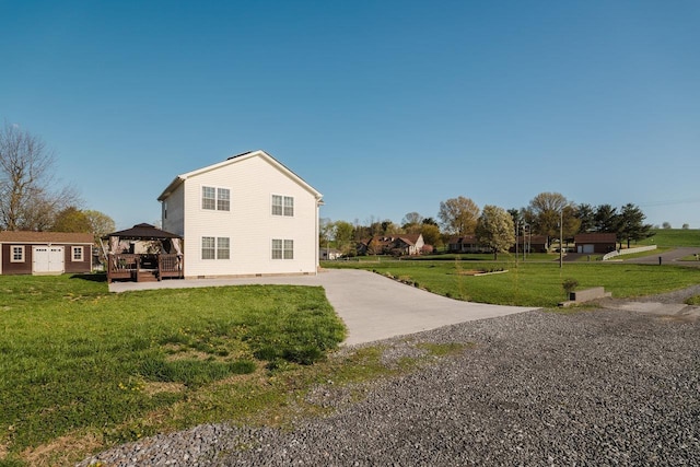 728 Mason St, Dayton, VA 22821 - view of side of home with a gazebo, a lawn, and an outbuilding