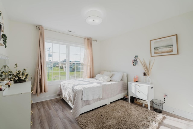 728 Mason St, Dayton, VA 22821 - bedroom featuring wood finished floors and baseboards