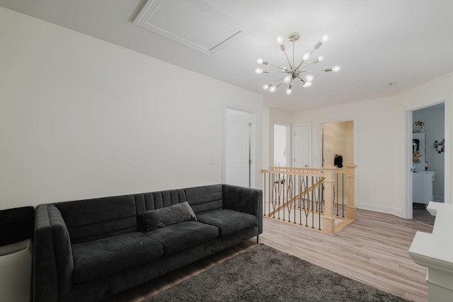 728 Mason St, Dayton, VA 22821 - living room with wood finished floors, a chandelier, and baseboards