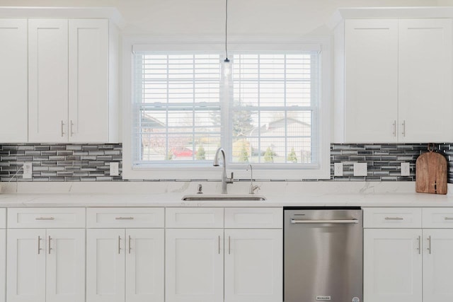728 Mason St, Dayton, VA 22821 - kitchen with stainless steel dishwasher, a sink, white cabinets, and decorative backsplash
