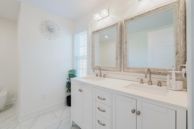 728 Mason St, Dayton, VA 22821 - bathroom with double vanity, marble finish floors, and baseboards