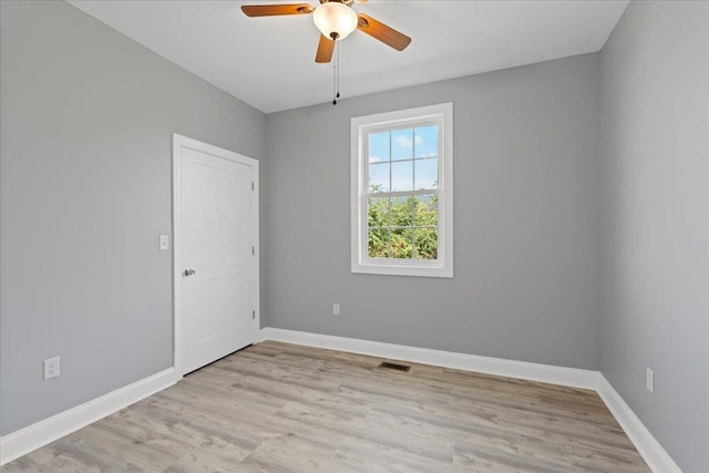795 Barrows Ct, Mcgaheysville, VA 22840 - unfurnished room featuring a ceiling fan, light wood-style floors, and baseboards