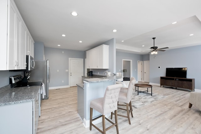 795 Barrows Ct, Mcgaheysville, VA 22840 - kitchen featuring stainless steel appliances, baseboards, white cabinets, light wood-style flooring, and recessed lighting