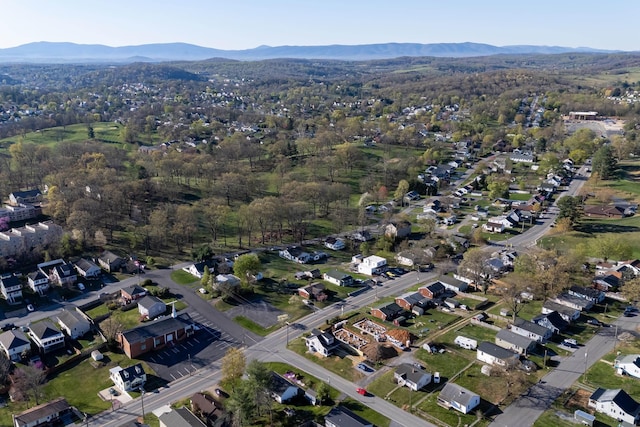 drone / aerial view featuring a mountain view and a residential view