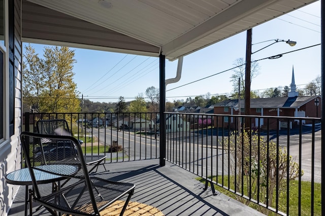 balcony featuring a residential view