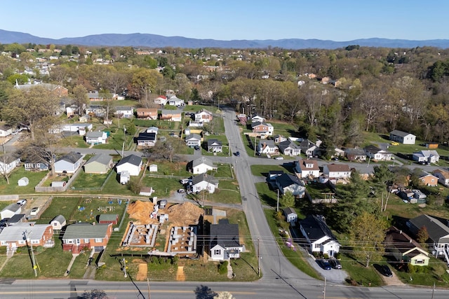 aerial view with a mountain view and a residential view