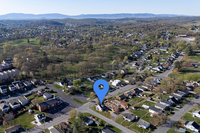 aerial view with a mountain view and a residential view