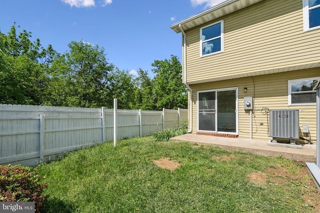 view of yard with central AC